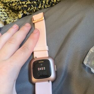 Fitbit Pink Smartwatch with Sleek Design